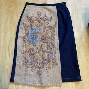 Dark wash tapestry denim skirt.